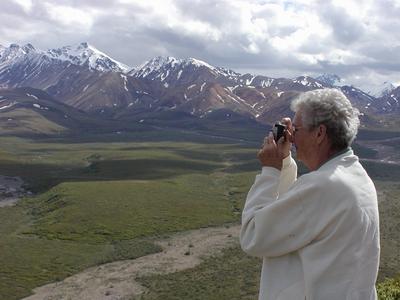 Mom taking picture of mountain